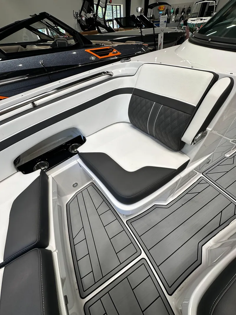 Slide: The Image of 2024 Monterey M6 boat interior with sleek seating and modern design. - 19