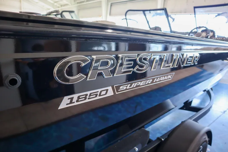 Slide: The Image of 2025 Crestliner 1850 Super Hawk WT JS boat in showroom. - 15