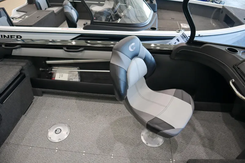 Slide: The Image of 2025 Crestliner 1850 Super Hawk WT JS interior with gray seating and spacious layout. - 8