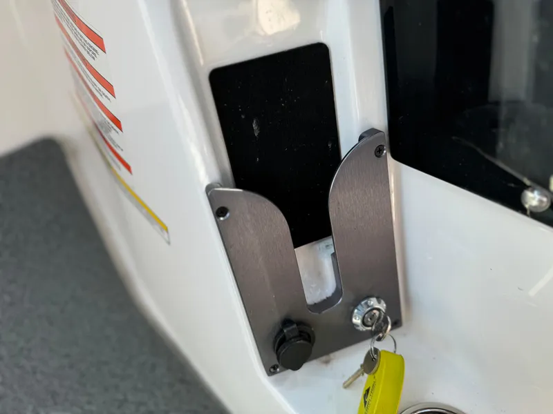 Slide: The Image of MasterCraft NXT20 2022 boat ignition with keys and safety instructions. - 17