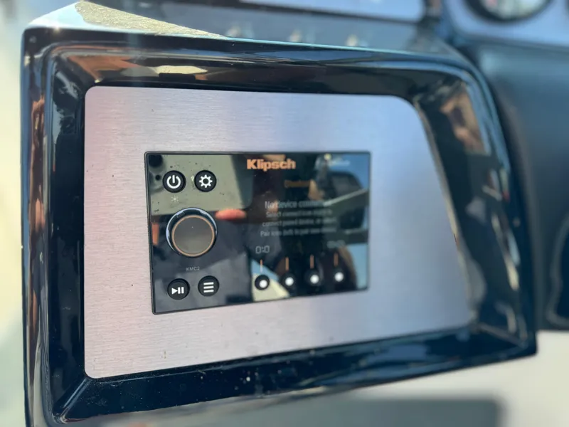 Slide: The Image of Klipsch audio control panel on 2022 MasterCraft NXT20 boat dashboard. - 26