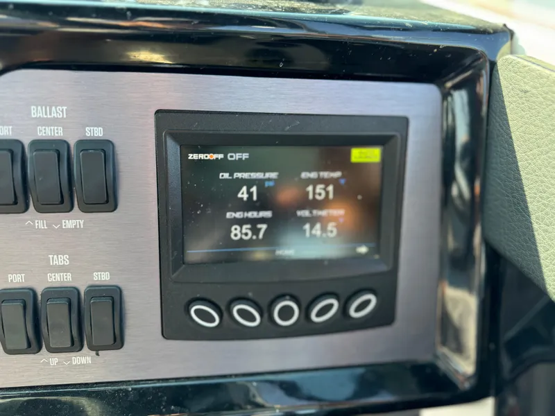 Slide: The Image of Dashboard of 2022 MasterCraft NXT20 boat showing engine metrics and controls. - 27