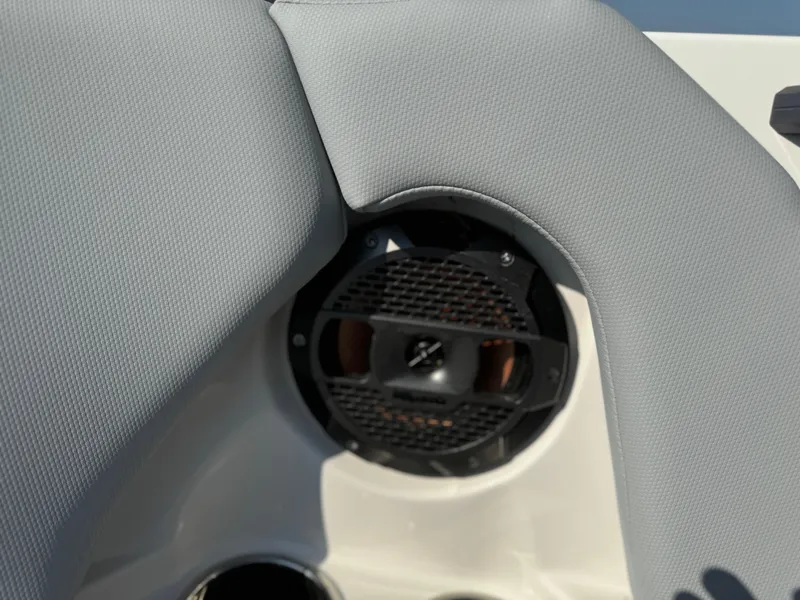 Slide: The Image of 2022 MasterCraft NXT20 boat speaker with gray upholstery detail. - 33
