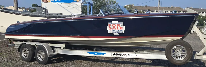 The Image of 2018 Cherubini Classic 24 boat for sale on trailer, covered and parked. - 0