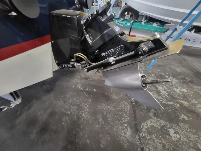 Slide: The Image of 2018 Cherubini Classic 24 boat with a detailed view of the propeller and drive system. - 16