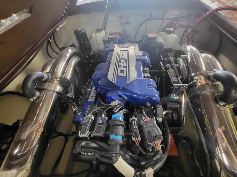 Slide: The Image of 2018 Cherubini Classic 24 boat on trailer, for sale sign displayed. - 22