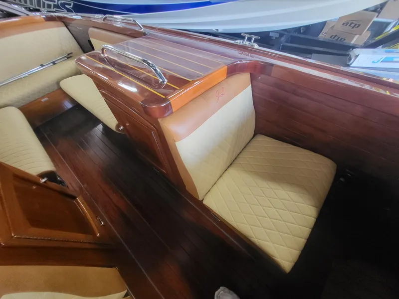 Slide: The Image of Luxurious interior of 2018 Cherubini Classic 24 boat with elegant wood and leather seating. - 33