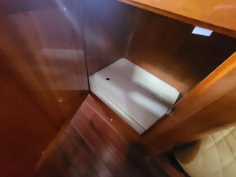 Slide: The Image of 2018 Cherubini Classic 24 boat with polished wood finish and beige seating. - 35