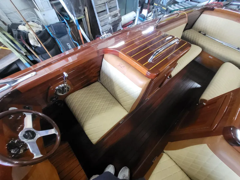 Slide: The Image of Luxurious interior of 2018 Cherubini Classic 24 with wood finish and modern control panel. - 39