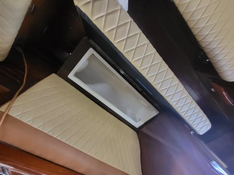 Slide: The Image of Interior of 2018 Cherubini Classic 24 boat with quilted seating and storage compartment. - 46