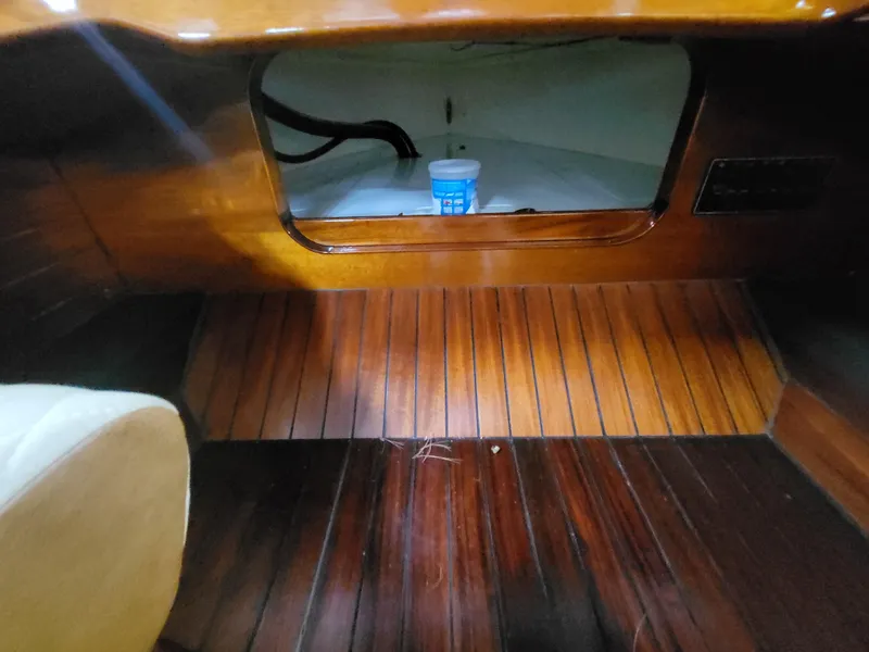 Slide: The Image of Interior of 2018 Cherubini Classic 24 showing built-in storage compartment. - 49