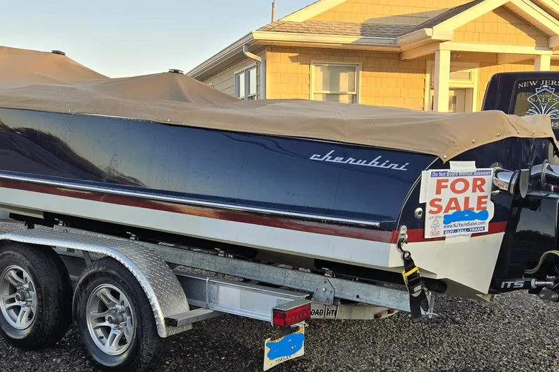 Slide: The Image of 2018 Cherubini Classic 24 boat for sale on trailer, covered and parked. - 60