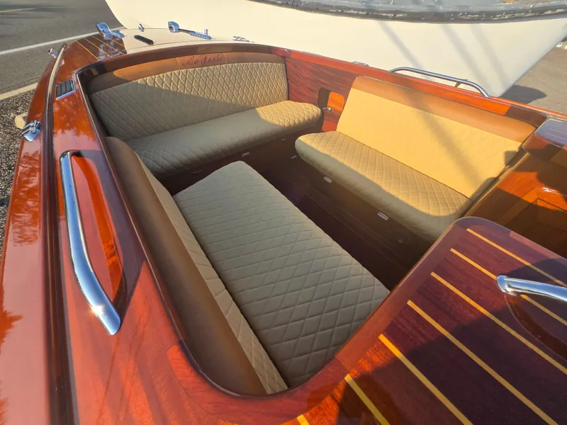 Slide: The Image of Luxurious interior of 2018 Cherubini Classic 24 boat with elegant tan seating. - 8