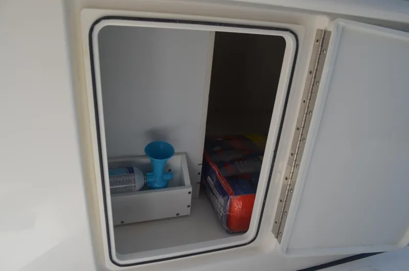 Slide: The Image of Storage under helm seats - 31