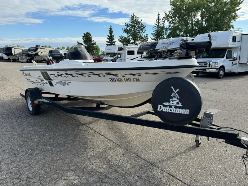 Slide: The Image of 2000 Yar-Craft 1785 Mille Lacs boat on trailer, parked in RV lot. - 2