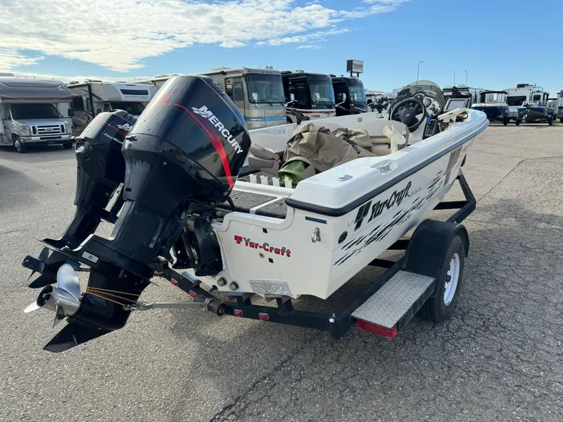 Slide: The Image of 2000 Yar-Craft 1785 Mille Lacs boat on trailer with Mercury outboard motor. - 3