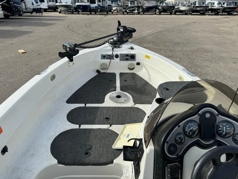 Slide: The Image of 2000 Yar-Craft 1785 Mille Lacs boat interior with control panel and seating. - 7