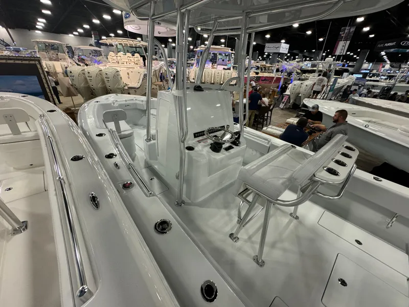 Slide: The Image of 2024 Contender 25 Tournament boat interior at a boat show. - 2