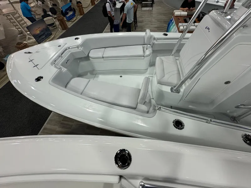Slide: The Image of 2024 Contender 25 Tournament boat interior with white seating and sleek design. - 3