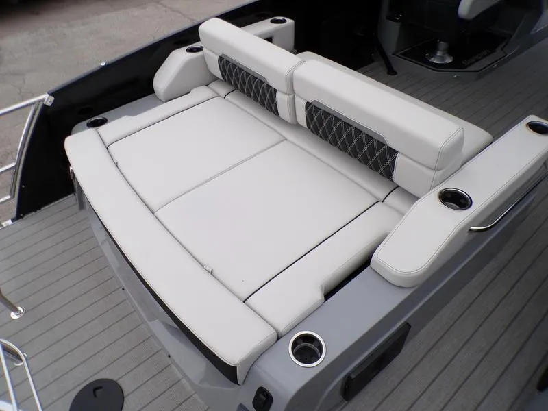 Slide: The Image of 2025 Godfrey Sanpan 2700 DFLW iMPACT PLUS boat seating area with cup holders. - 11