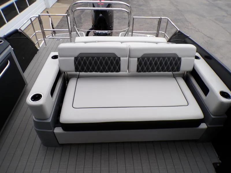 Slide: The Image of 2025 Godfrey Sanpan 2700 DFLW boat interior with luxurious seating and modern design. - 12