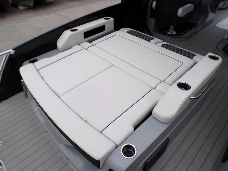 Slide: The Image of 2025 Godfrey Sanpan 2700 DFLW boat with spacious, cushioned seating and cup holders. - 15