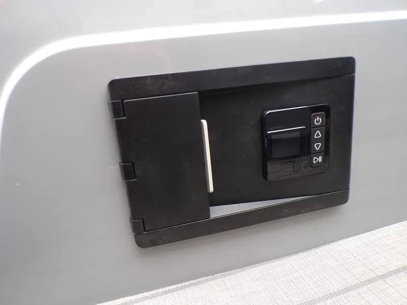 Slide: The Image of Control panel on 2025 Godfrey Sanpan 2700 DFLW iMPACT PLUS pontoon boat. - 18