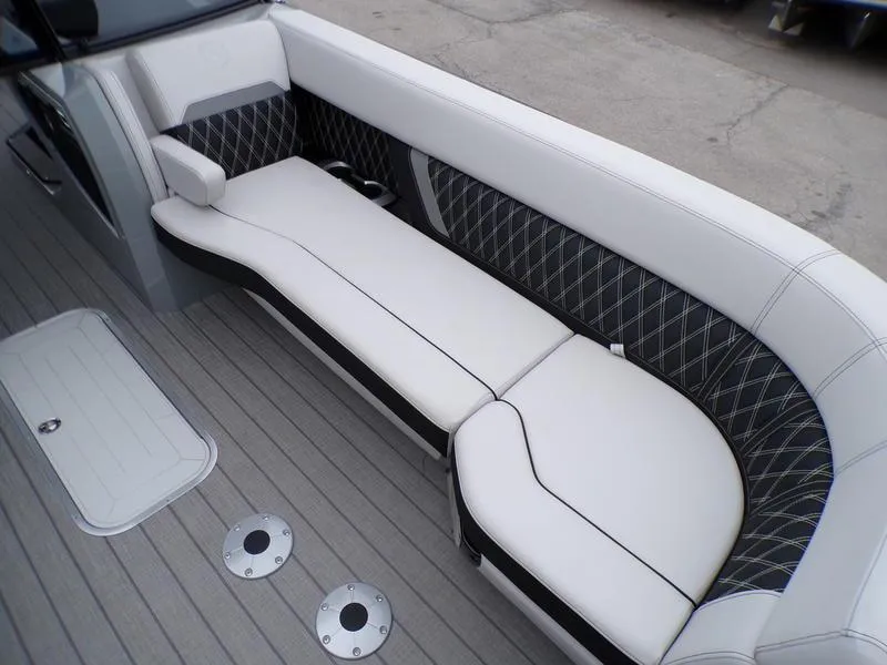 Slide: The Image of 2025 Godfrey Sanpan 2700 DFLW boat interior with luxurious seating and modern design. - 28