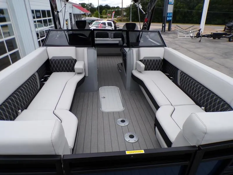 Slide: The Image of 2025 Godfrey Sanpan 2700 DFLW iMPACT PLUS pontoon boat interior with luxurious seating. - 29