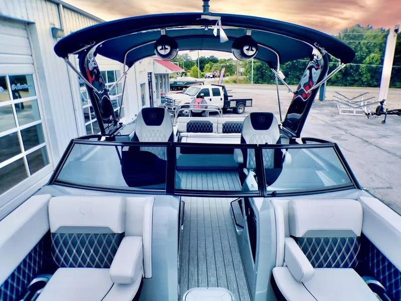 Slide: The Image of 2025 Godfrey Sanpan 2700 DFLW iMPACT PLUS pontoon boat with luxurious seating and modern design. - 7