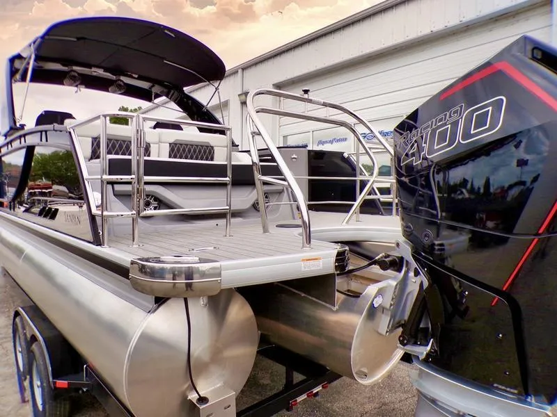 Slide: The Image of 2025 Godfrey Sanpan 2700 DFLW pontoon boat with powerful outboard motor. - 9