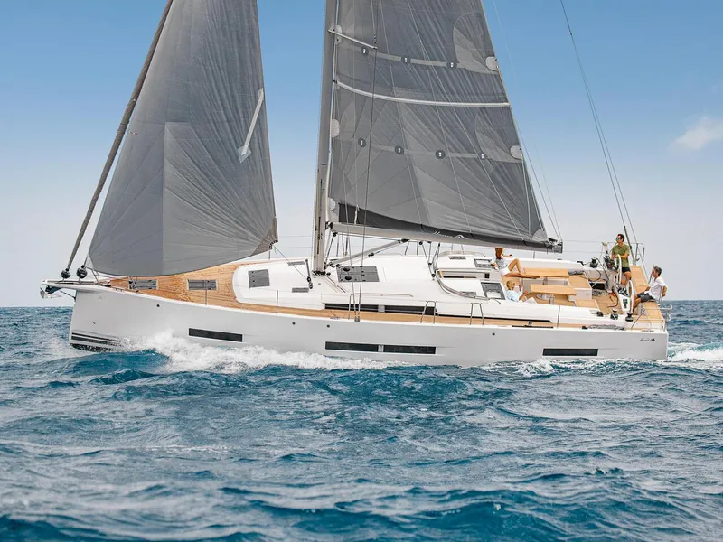 Slide: The Image of 2025 Hanse 510 yacht sailing on open sea with sleek design and modern sails. - 33