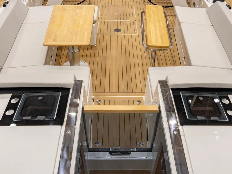 Slide: The Image of Luxurious 2025 Hanse 510 yacht interior with elegant wood flooring and seating. - 7