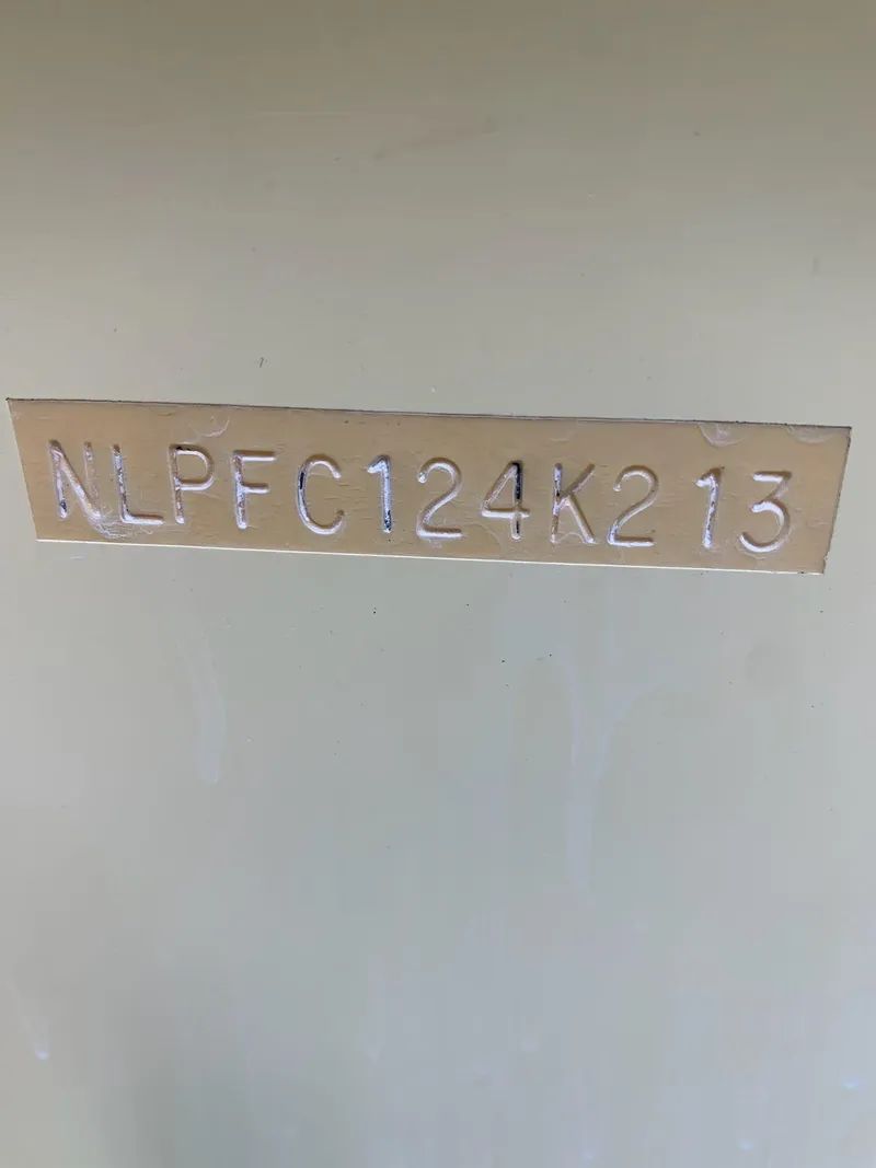 Slide: The Image of Hull identification number on 2013 Tidewater 250 CC Adventure boat. - 23