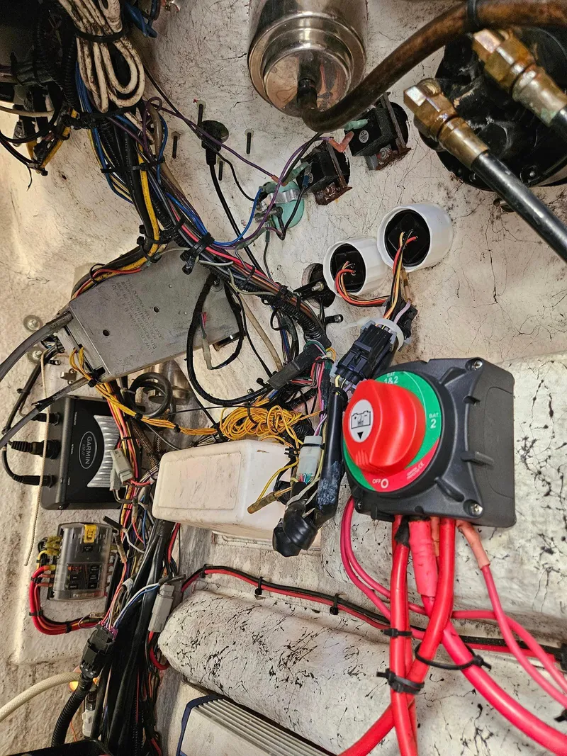 Slide: The Image of 2013 Tidewater 250 CC Adventure boat wiring and electrical components. - 35