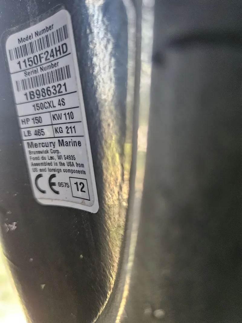 Slide: The Image of Close-up of Mercury Marine engine label on 2013 Tidewater 250 CC Adventure. - 43