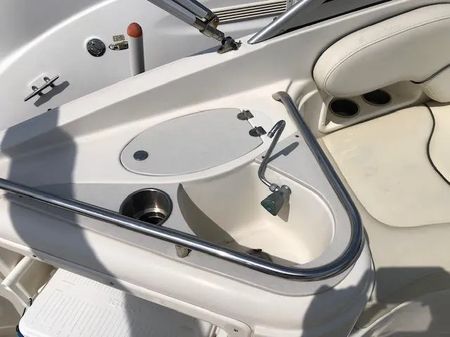 Slide: The Image of 2007 Monterey 250 Cruiser boat interior with sink and seating area. - 7