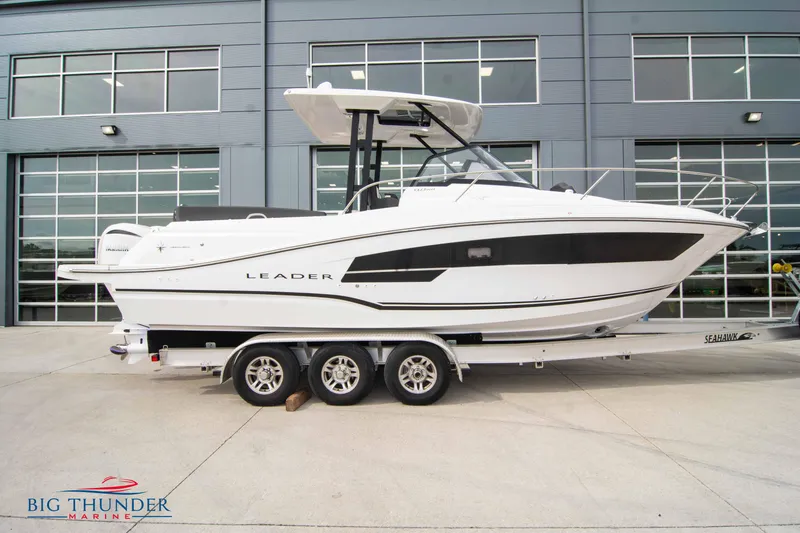 The Image of 2024 Jeanneau Leader 9.0 WA boat on trailer outside Big Thunder Marine. - 0