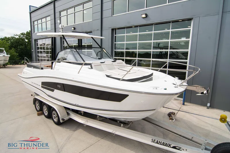 Slide: The Image of 2024 Jeanneau Leader 9.0 WA boat on trailer at Big Thunder Marine. - 2