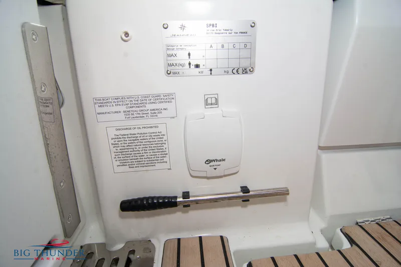 Slide: The Image of 2024 Jeanneau Leader 9.0 WA boat interior with control panel and safety instructions. - 20