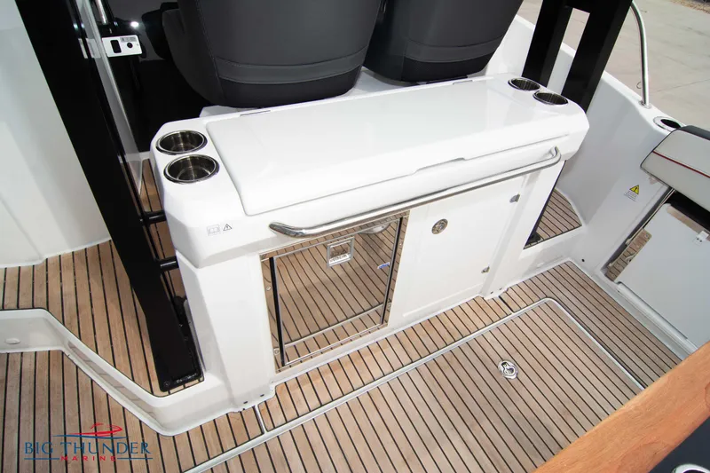 Slide: The Image of 2024 Jeanneau Leader 9.0 WA boat interior with sleek design and wood flooring. - 22