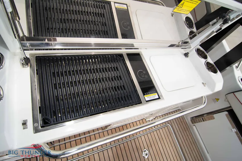 Slide: The Image of 2024 Jeanneau Leader 9.0 WA boat deck with grill and sink. - 23