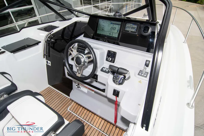 Slide: The Image of 2024 Jeanneau Leader 9.0 WA cockpit with modern controls and navigation displays. - 28