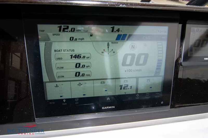 Slide: The Image of Garmin display on 2024 Jeanneau Leader 9.0 WA showing boat status and trip data. - 30