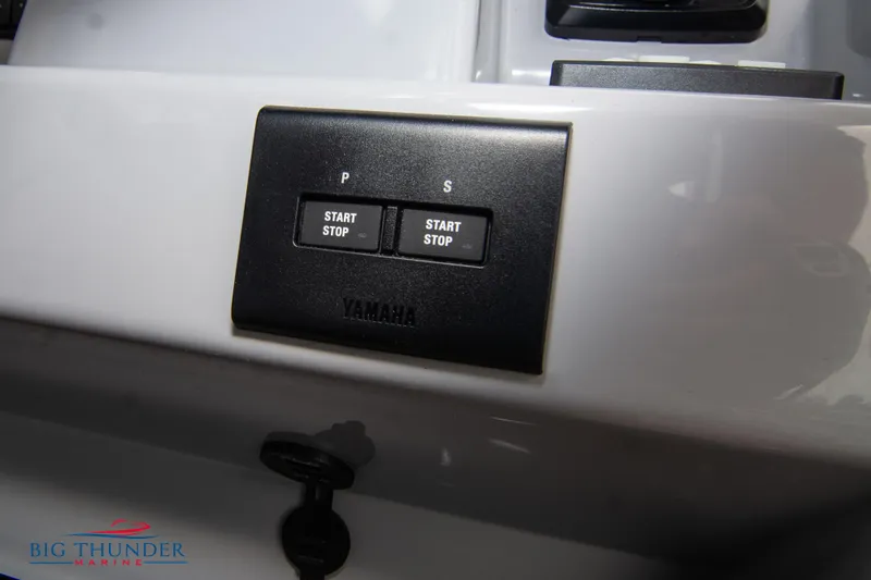 Slide: The Image of Yamaha start-stop panel on 2024 Jeanneau Leader 9.0 WA boat dashboard. - 33