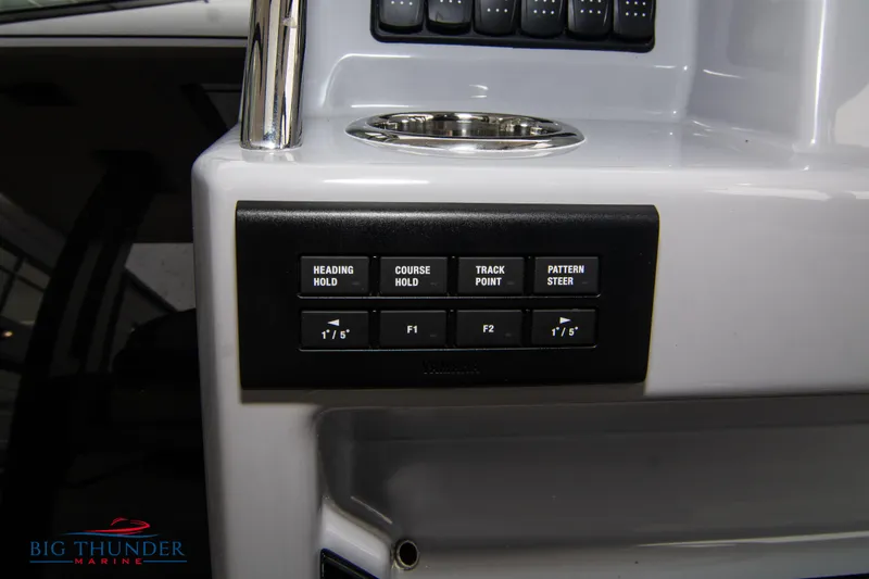 Slide: The Image of 2024 Jeanneau Leader 9.0 WA control panel with navigation buttons. - 34