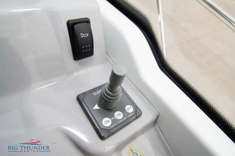 Slide: The Image of Joystick control panel on 2024 Jeanneau Leader 9.0 WA boat dashboard. - 37