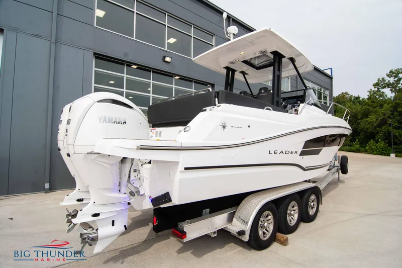 Slide: The Image of 2024 Jeanneau Leader 9.0 WA boat on trailer, featuring twin Yamaha engines. - 4