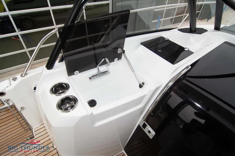 Slide: The Image of 2024 Jeanneau Leader 9.0 WA boat cockpit with sleek design and modern amenities. - 42