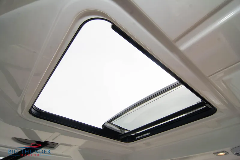 Slide: The Image of 2024 Jeanneau Leader 9.0 WA sunroof detail, showcasing sleek design and open sky view. - 44